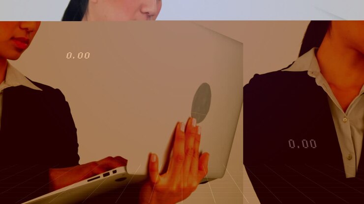 Businesswoman typing on laptop, animating line graphs and numbers, reviewing analytics and smiling