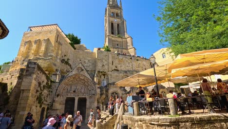 visitors explore historic chapel and outdoor cafe