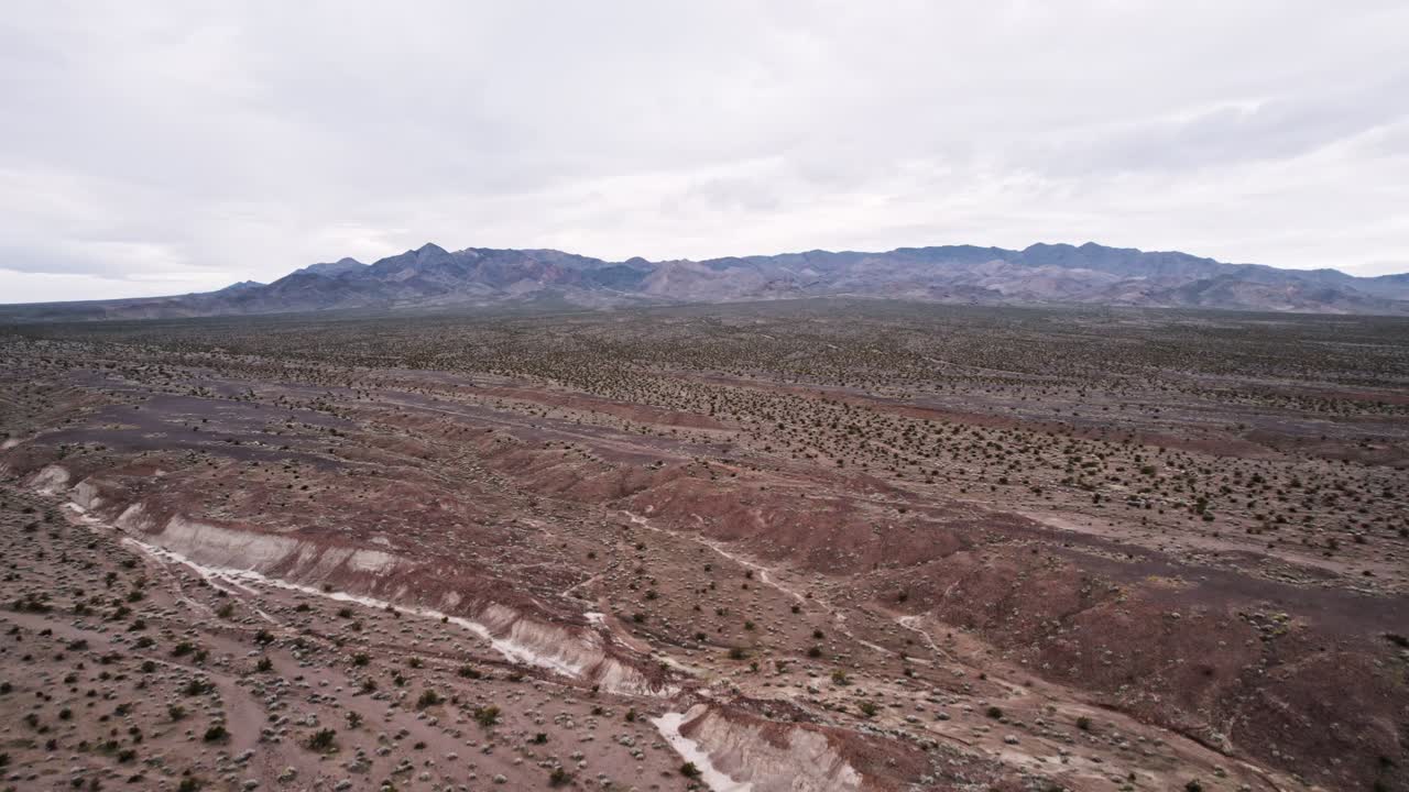 Aerial Drone View of a Vast Rocky Desert Landscape in California with Dramatic Terrain