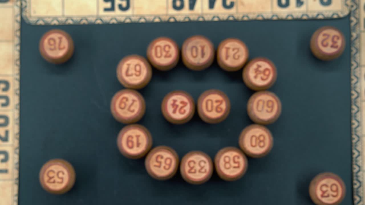 Cinematic close-up smooth zoom in shot from above of a Bingo wooden barrels in a circle, woody figures, old numbers background, vintage board game, professional lighting, slow motion 4K video