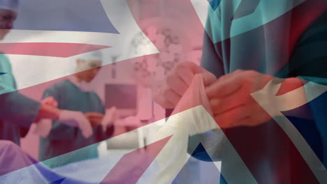 animación de la bandera del reino unido sobre los médicos durante la cirugía