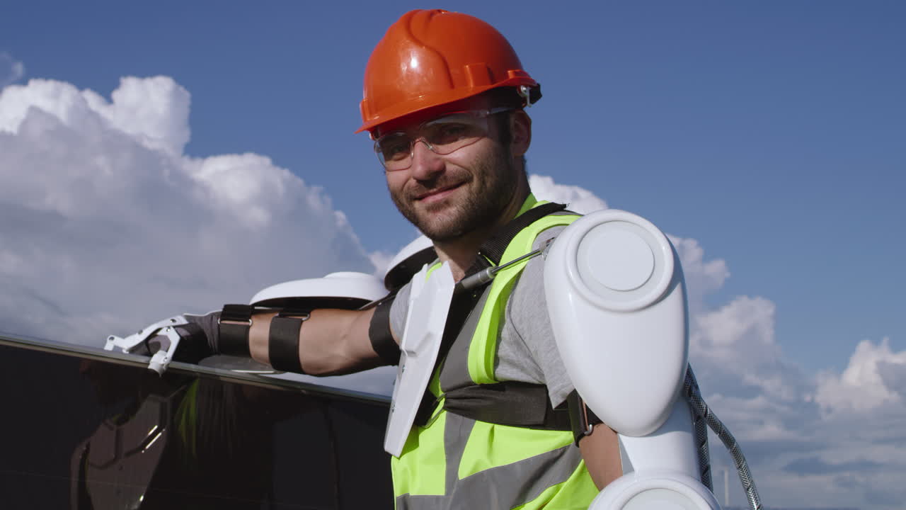 Engineer with Robotic Arm Working on Solar Panels