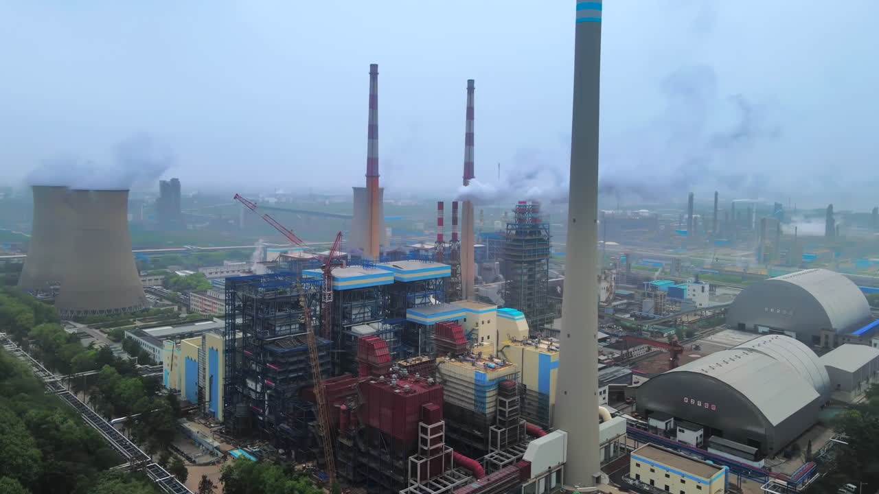 real shot of polluted exhaust gas emissions in industrial chemical factory area time-lapse huge polluting industry facility