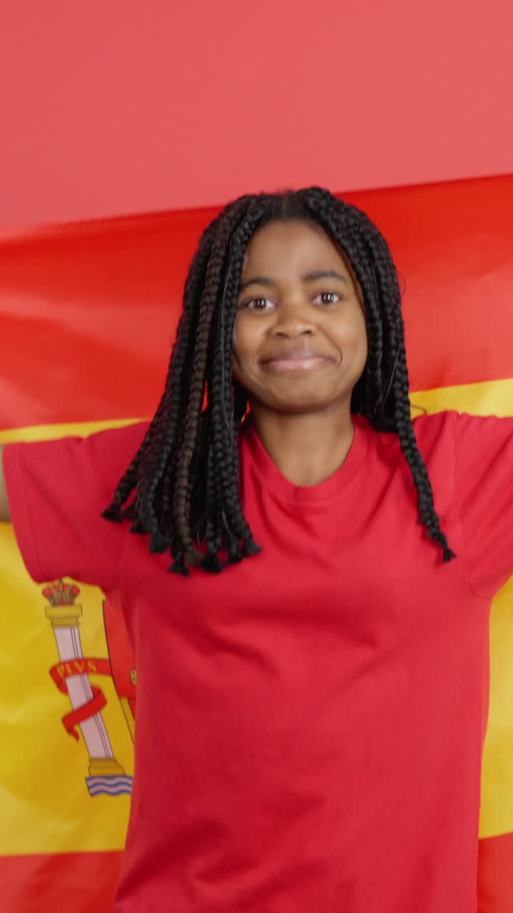 Woman celebrating with Spain flag