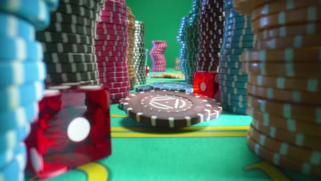 Casino chips and dice on a green table