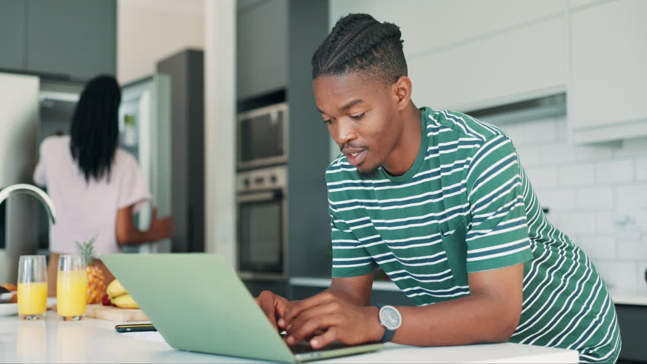 Couple Working Together in the Kitchen