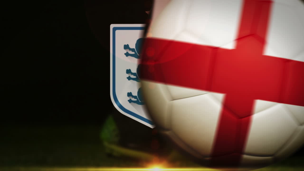Football player kicking england flag ball
