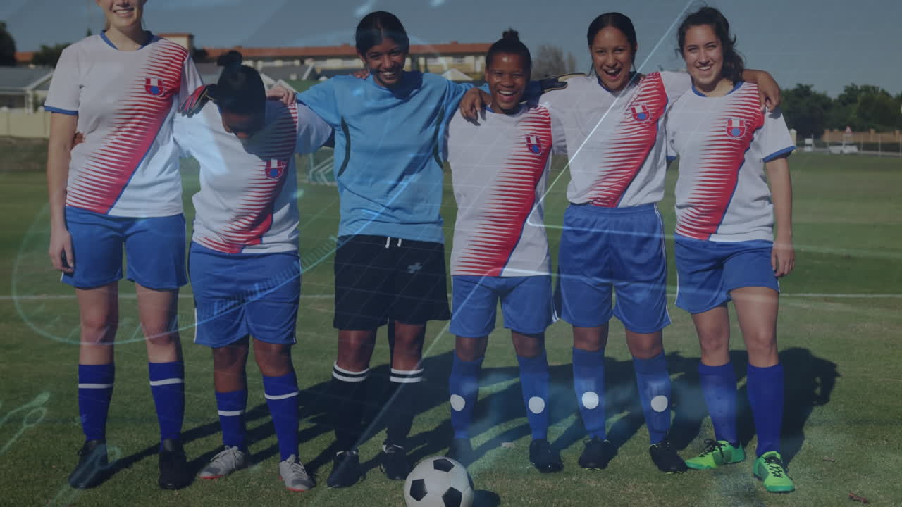 Animation of speedometer over multiracial female soccer players with arms around standing on ground