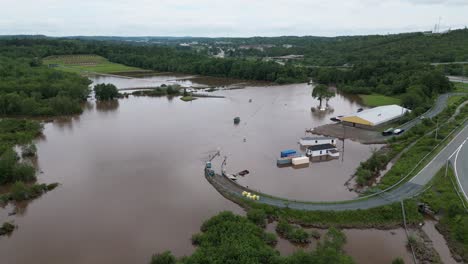 highway roads flooded diverting traffic after river floodwater submerges streets and fields