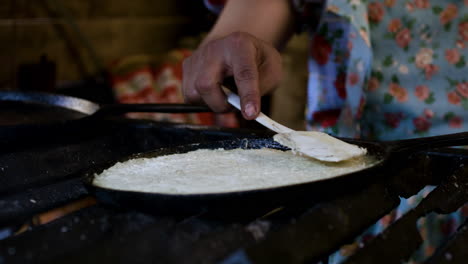 woman cooking latin food