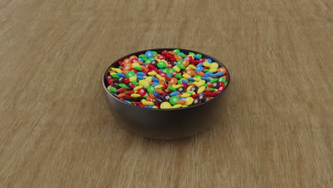 a bowl of colorful m&m's candies