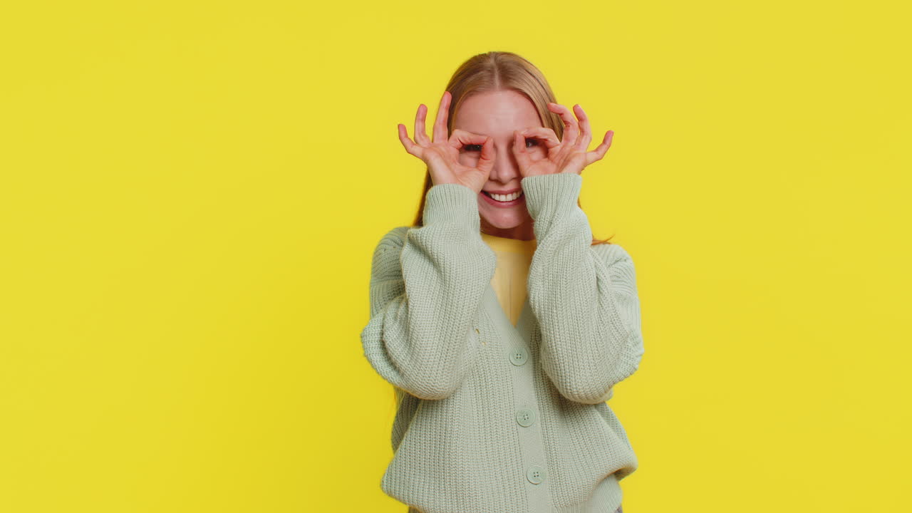 Happy young woman showing ok gesture like sign positive feedback celebrate victory approve idea