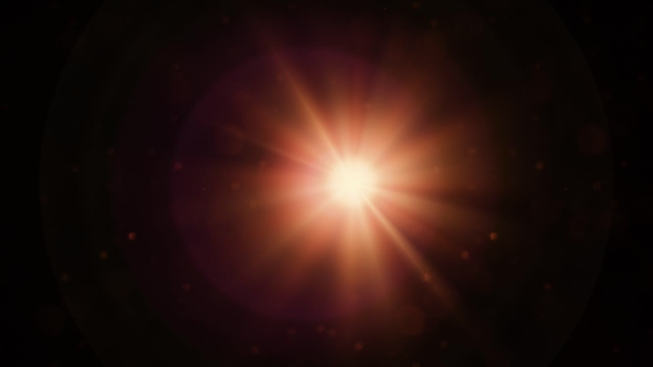 Explosión de luz dorada brillante con destello de lente óptico y partículas