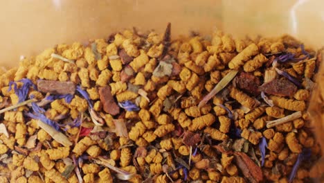 close-up of a colorful herbal tea blend in a bag