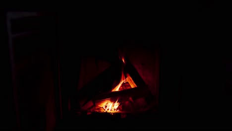 glowing wood fire flames on a fireplace