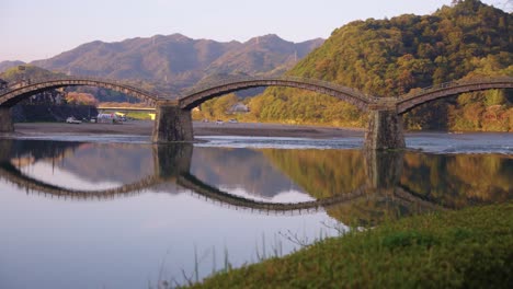 medieval japanese arched bridge, kintaikyo in iwakuni, spring morning in japan