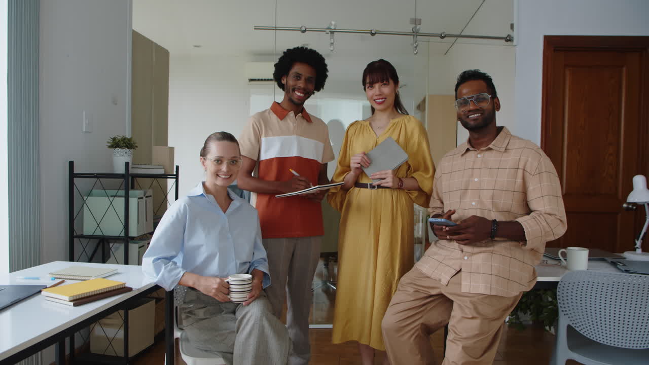 Portrait of Multiethnic Team of Coworkers Meeting at Office