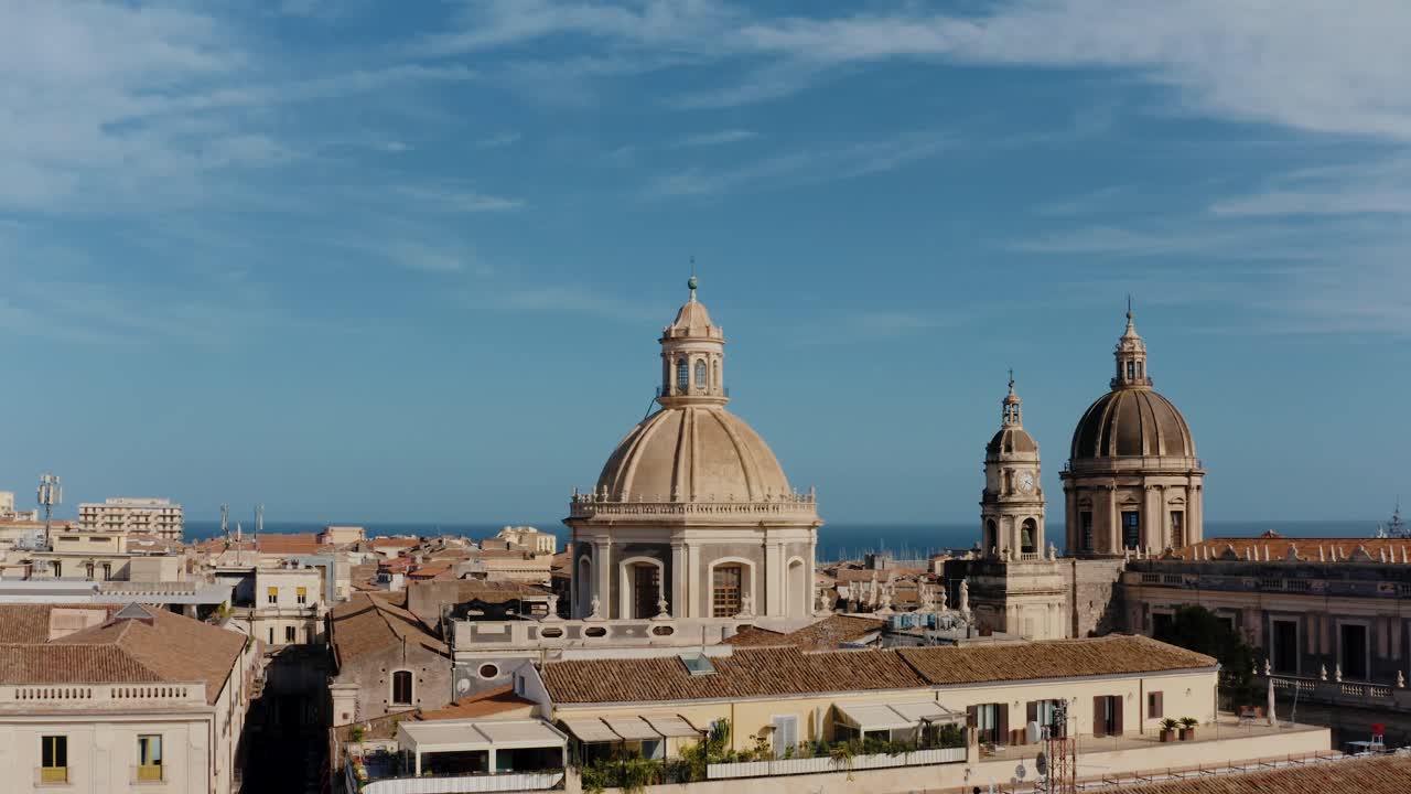 Aerial view of Saint Agata Cathedral tower in old town of Catania. Historic city in Sicily, Italy. UNESCO World heritage.
