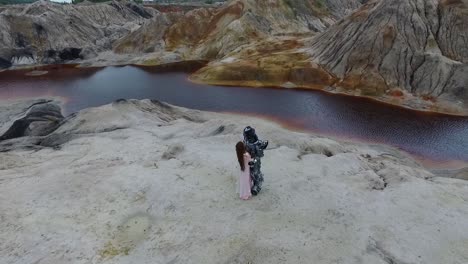 couple posing in a quarry landscape