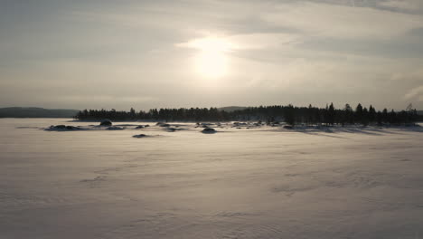 flight-over-a-frozen-lake-in-lapland