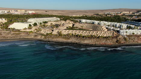 Costa-Calma,-Fuerteventura:-aerial-orbital-view-of-the-area-where-you-can-see-the-coast-and-the-resorts-of-the-tourist-area