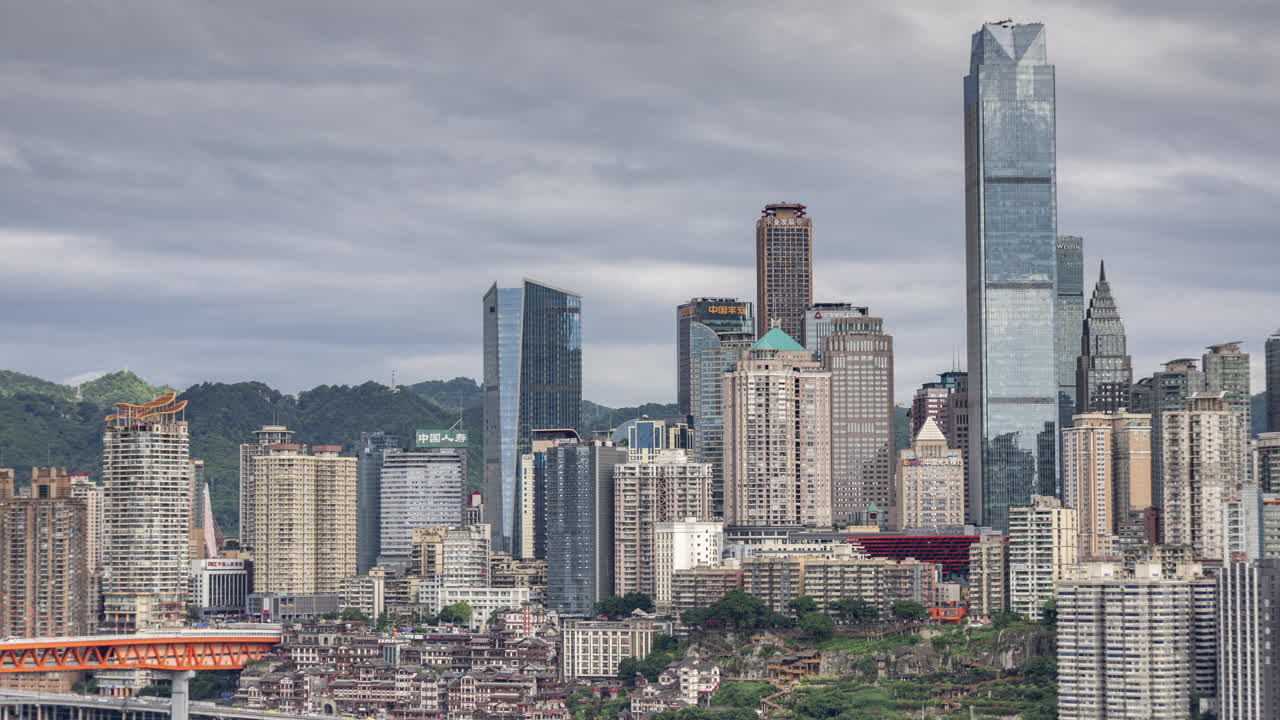 Timelapse of the amazing Chongqing cyberpunk city skyline reflected in a pool at night