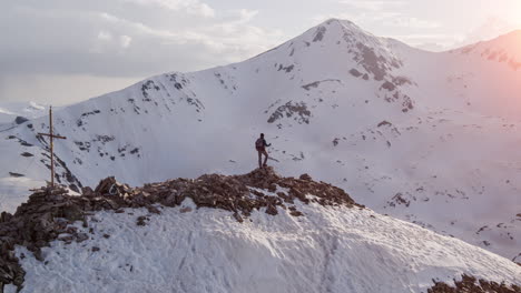 hiker on mountain summit