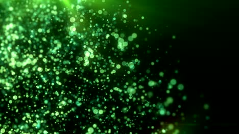 partículas desenfocadas verdes y luz uhd