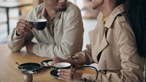 couple, tea and kiss with love at cafe