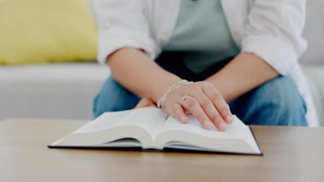 hands, bible book and table with woman