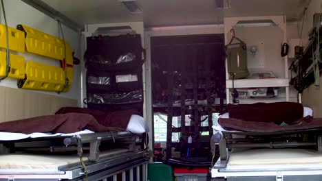 military search and rescue van from the inside. two paramedic beds in van.