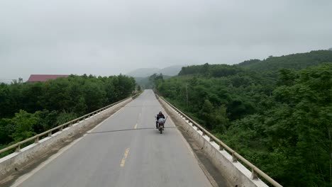 motorcycle on a bridge in the countryside
