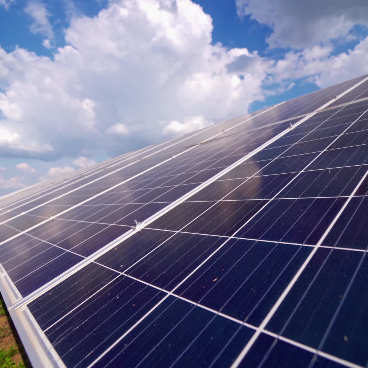 Blue solar panel under blue sky. Production of clean alternative energy. New energy concept. Close-up.