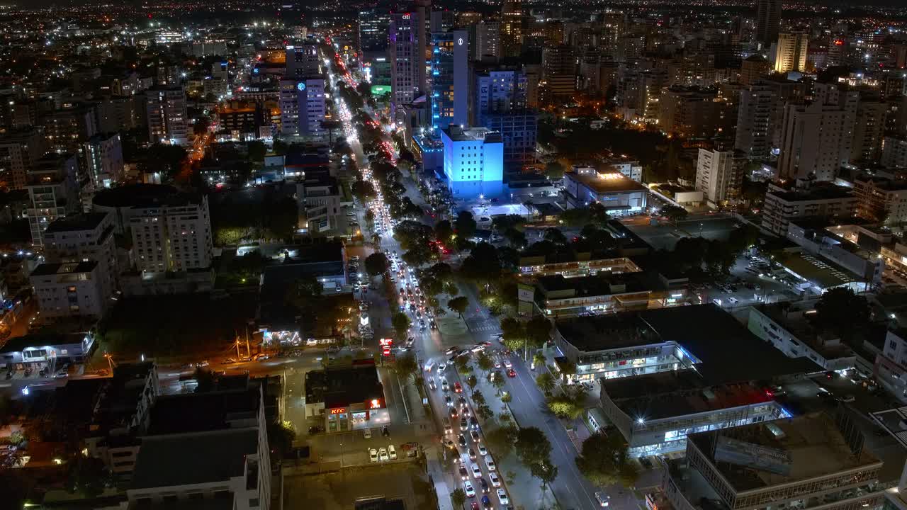 Timelapse of Santo Domingo busy road with car traffic at night, Dominican Republic