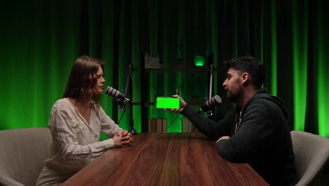podcast interview in studio with green screen phone
