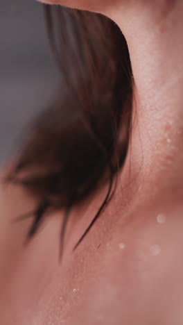 young woman with problematic skin stands in shower. naked lady waits for skin to dry to get out of bathroom. bare woman with acne stands in bathroom