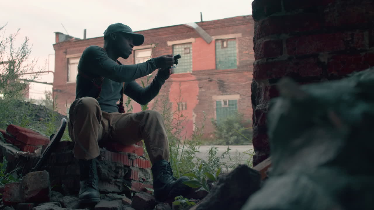 Man checking his gun