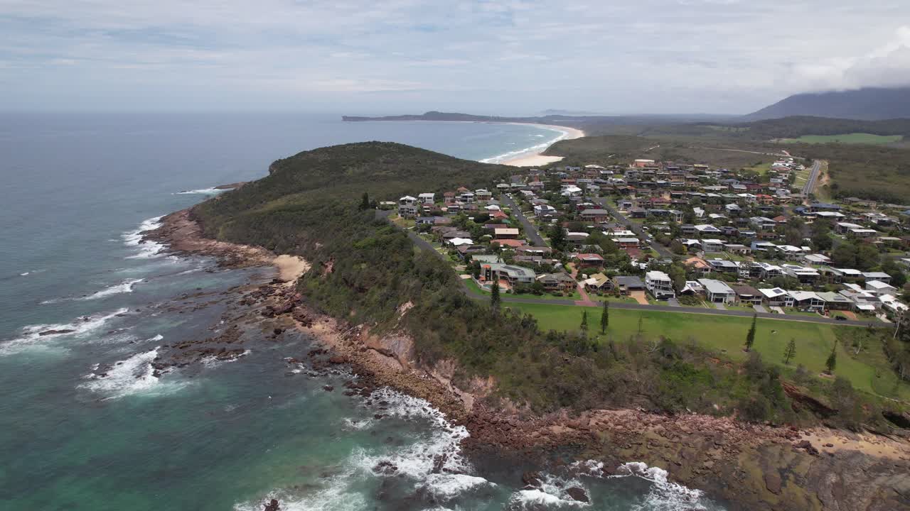 Coastal Town Of Bonny Hills On Tasman Sea Near Port Macquarie In New South Wales, Australia. aerial sideways shot