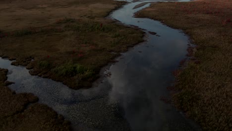 Low-Water-Level-Of-The-Stream-With-Cloudy-Sky-Reflections-In-Eastern-Townships,-Quebec-Canada-Through-Fall-Season