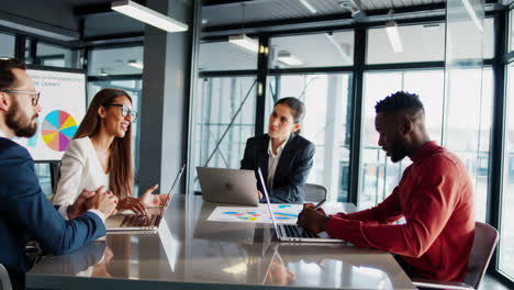 diverse business professionals collaborating in a modern office meeting