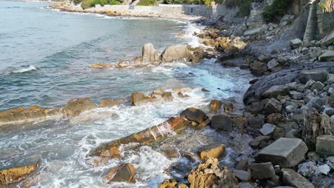 tuscan mediterranean coast: slow-motion drone footage of breaking waves