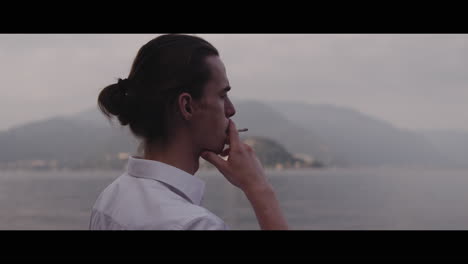 Man Contemplating Lakeside View
