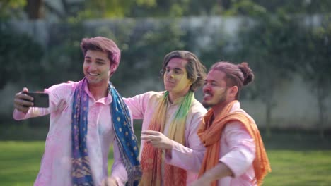 Indian-men-clicking-pictures-on-Holi-festival