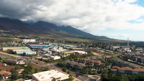 hawaii island mountains and township of lahaina, aerial ascend view