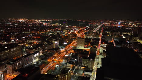 aerial establishing shot of city at night