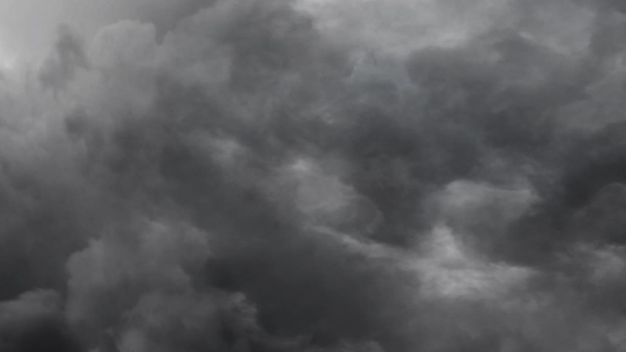 Several Flashes With Bolts in gray clouds