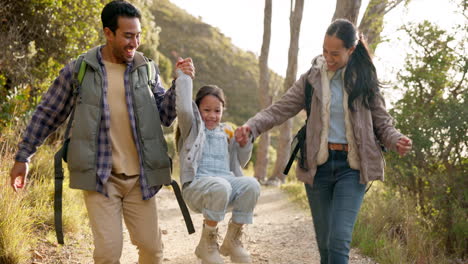 Happy-family,-hiking-and-holding-hands-outdoor