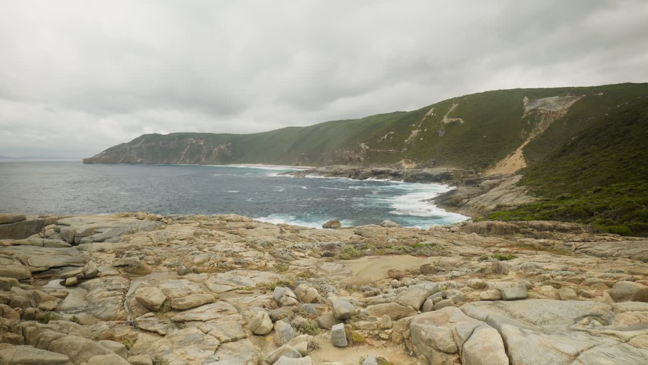 A stunning wide shot of The Gap Beach, featuring rolling waves, rugged coastline, and untouched sandy shores, capturing the raw beauty of nature in a remote and peaceful setting.