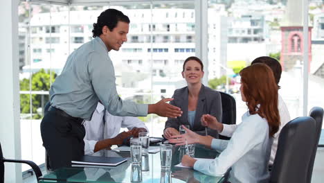 Businessman-shakes-hands-and-leaves