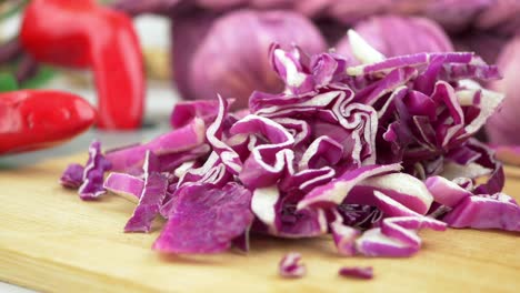 chopped red cabbage on a wooden cutting board